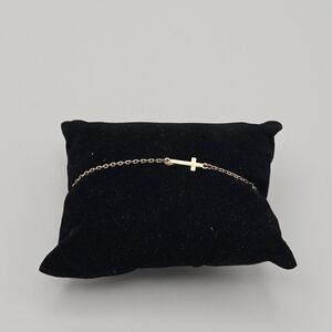 gold tone chain bracelet with cross charm